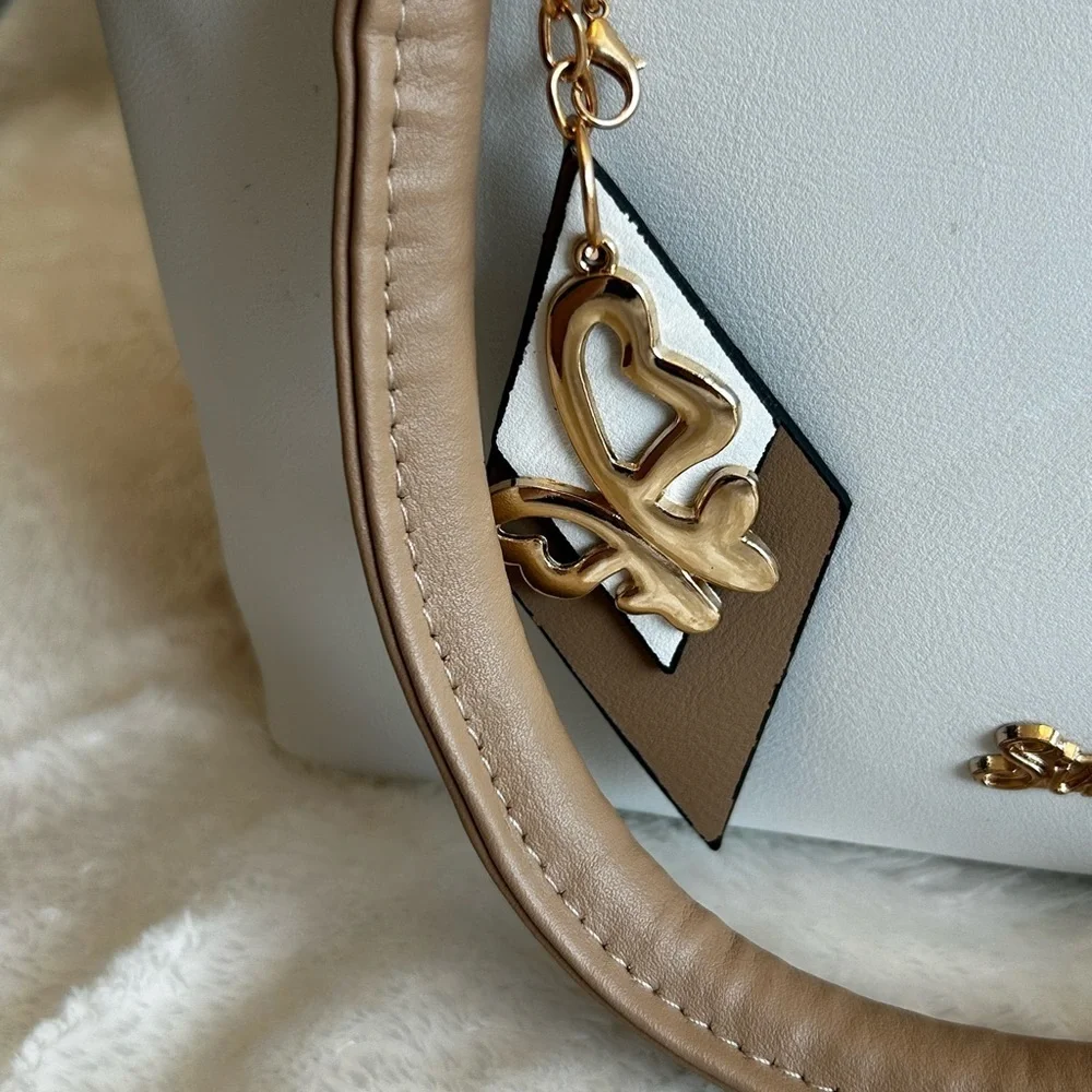 SiMYEER White And Tan Satchel